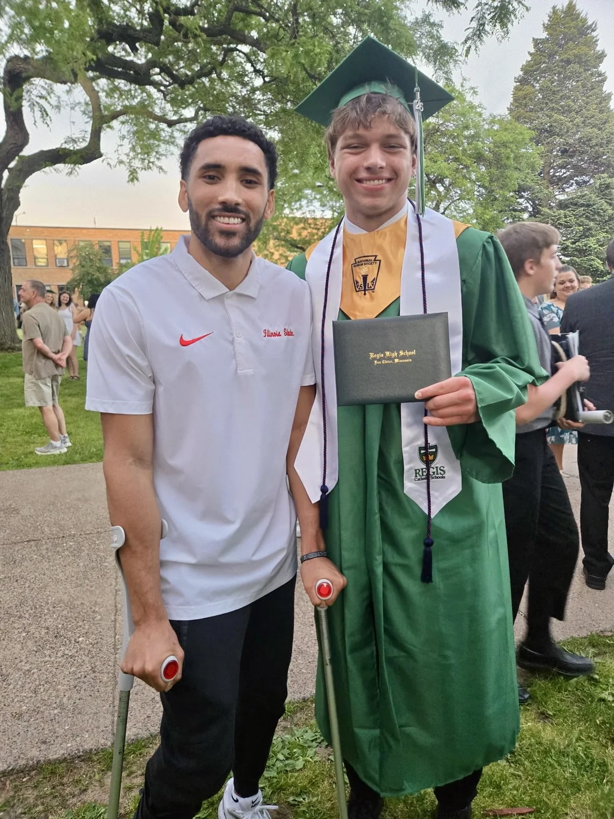 Core3 mentor with an athlete at graduation